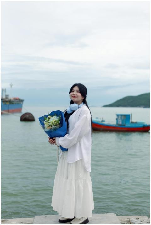Young Woman Bouquet Sea