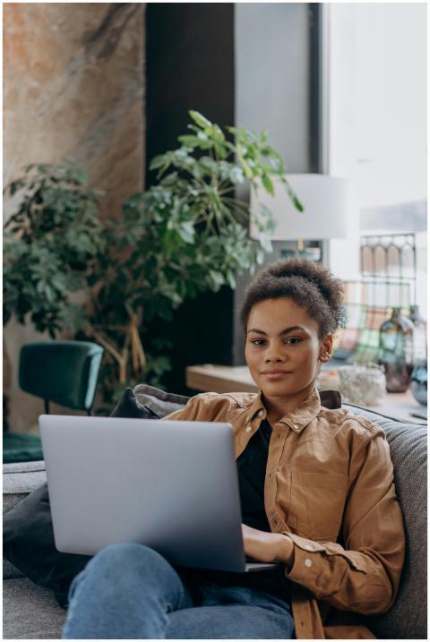 Confident African American woman working on a lapt