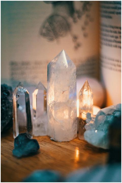 Beautiful quartz crystals displayed on a wooden ta