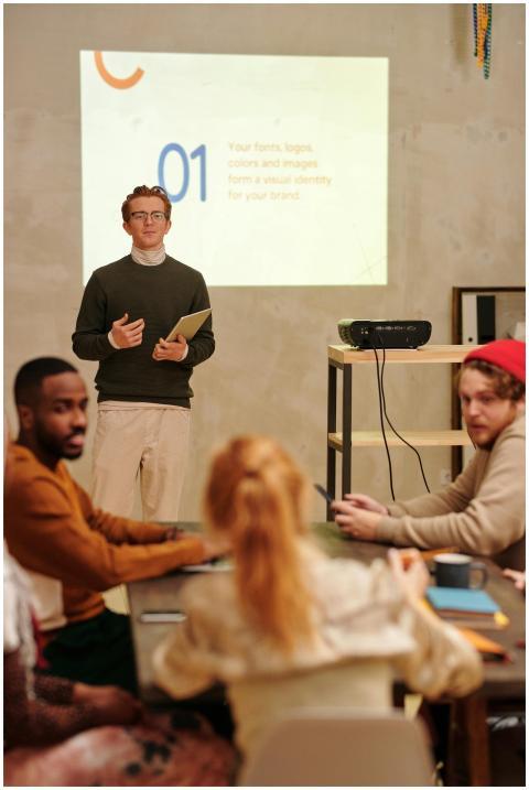 Diverse team engaged in a presentation with visual