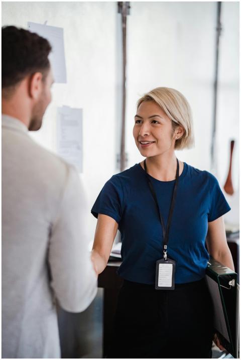 Friendly handshake between business professionals