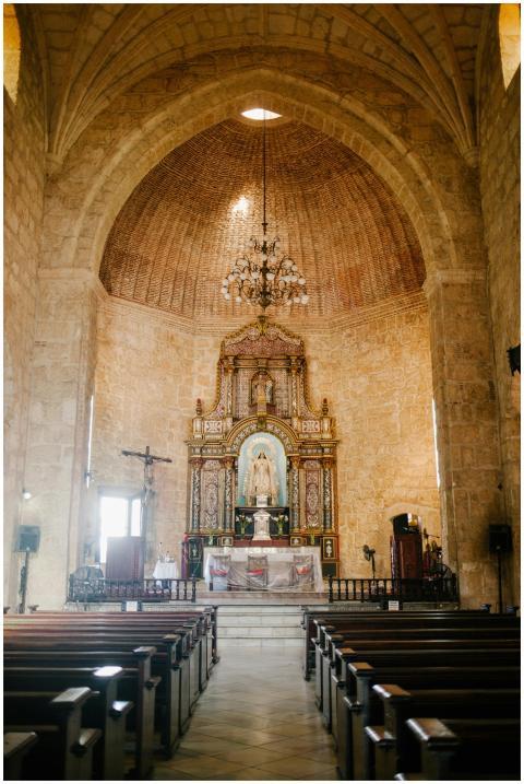 Inside of Christian church with wooden benches for
