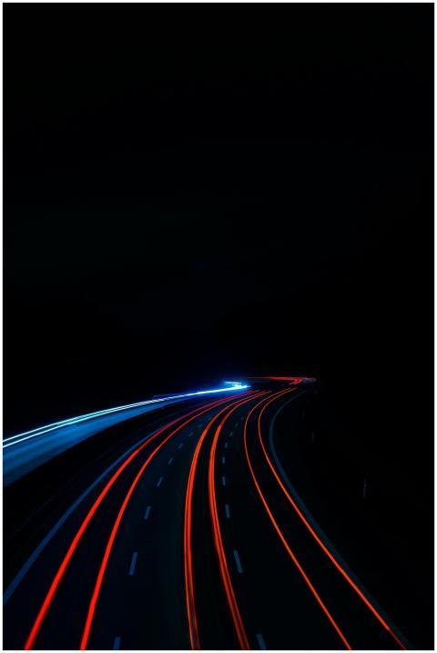Long exposure of light trails on a highway at nigh