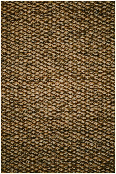 Detailed shot of a brown woven textile showcasing