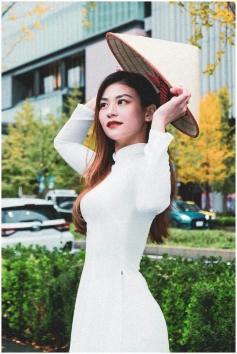 Elegant Woman Holding Traditional