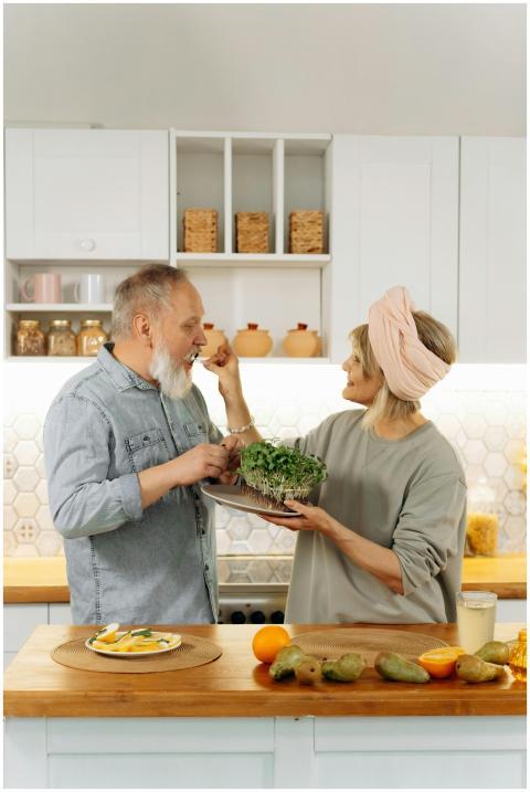 Senior couple preparing a healthy breakfast togeth