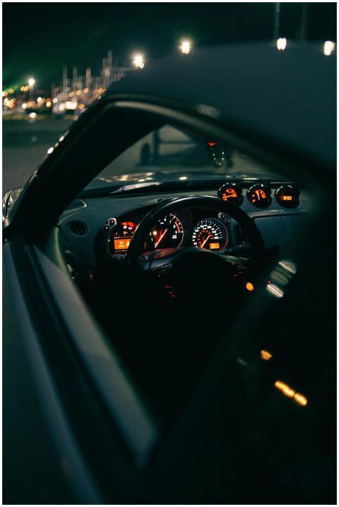 Illuminated car dashboard and steering wheel viewe