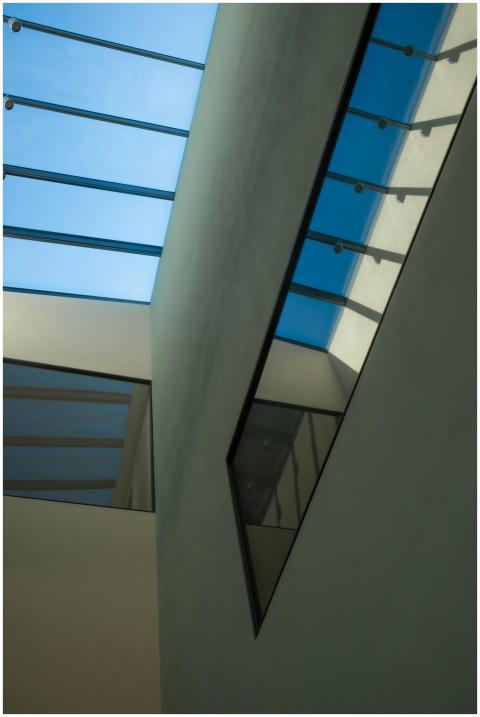 Low angle view of a modern building interior featu
