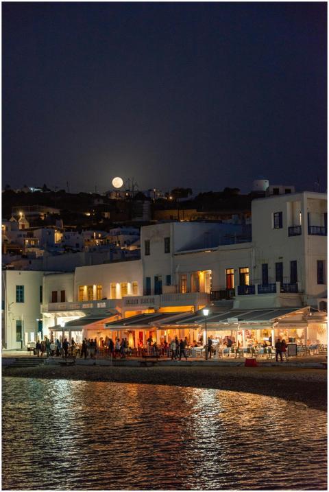Night view of a Greek island town with traditional