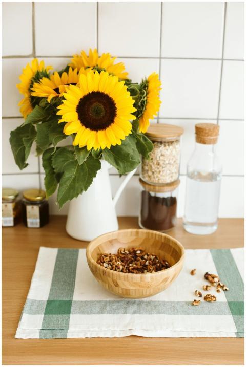 Elegant kitchen setup with sunflowers and nuts on