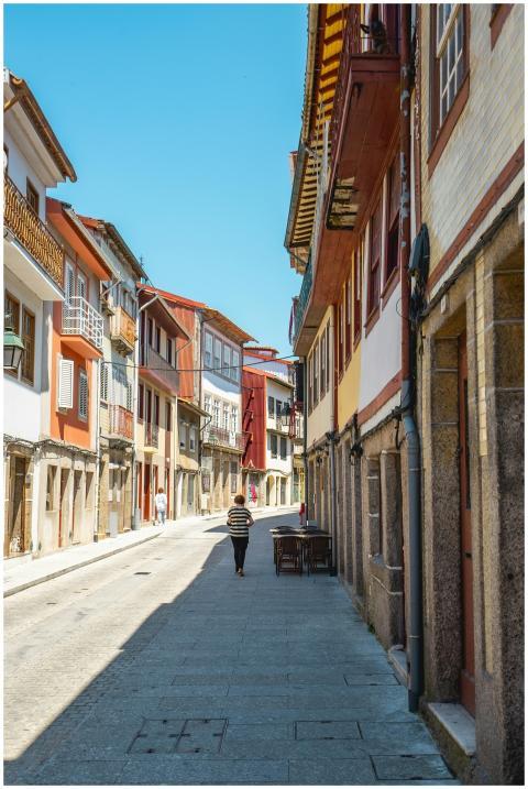 Sunny day view of a charming, historic street in G