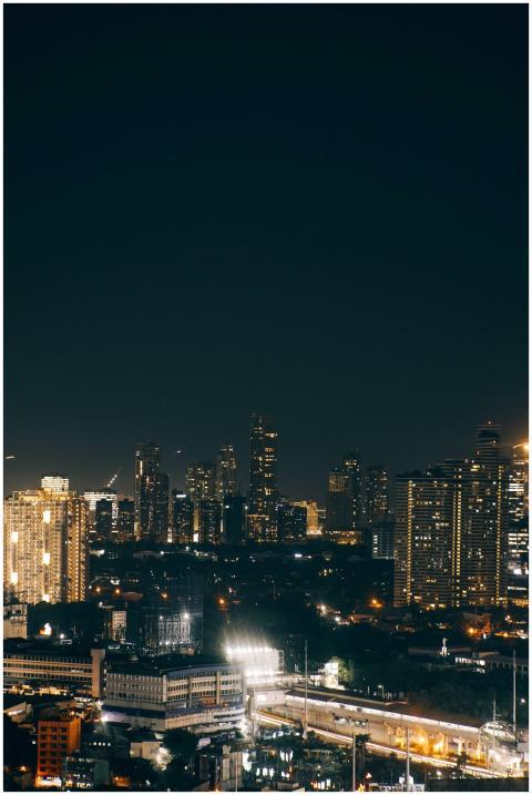 A stunning aerial view of a city skyline at night,