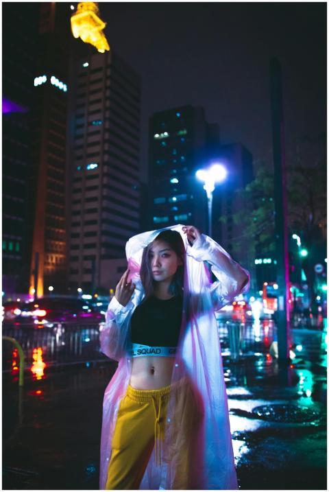 Portrait of an Asian woman in urban fashion with a