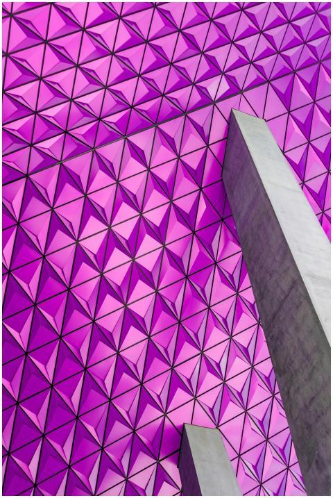 Vibrant purple geometric building facade in Toront