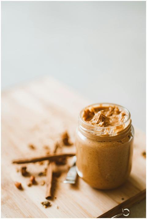 Delicious homemade organic peanut butter in a glas