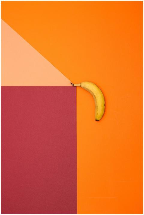 Colorful abstract design featuring a banana on mul
