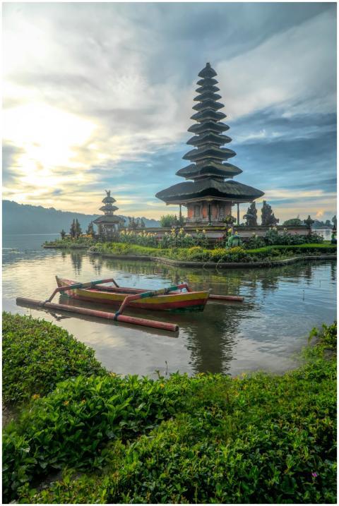 Scenic view of Ulun Danu Beratan Temple with boats