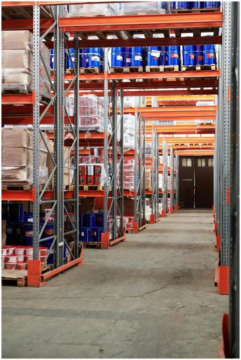 Industrial warehouse interior with organized shelv