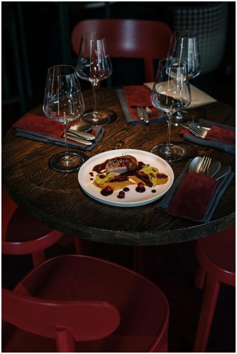 Elegant restaurant table setup featuring gourmet m