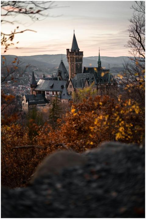 A scenic view of Wernigerode Castle surrounded by
