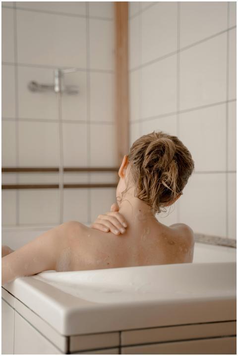 Woman enjoying a soothing bath moment, highlightin