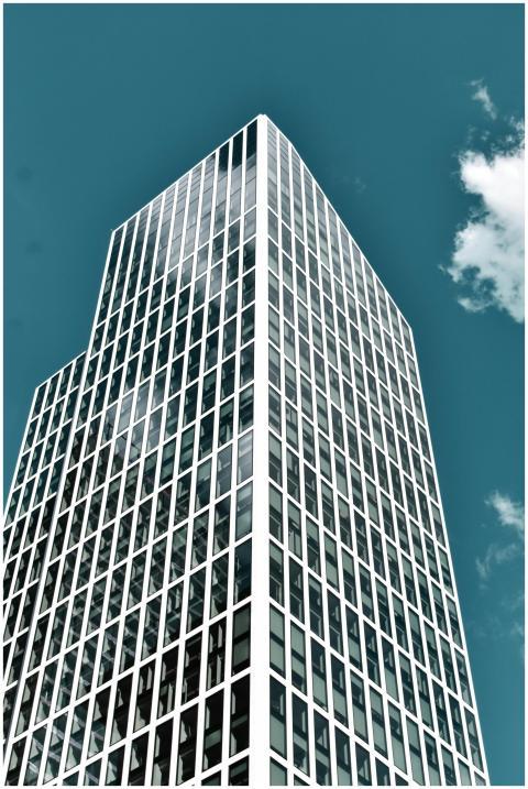 Low angle shot of a sleek modern skyscraper in Fra