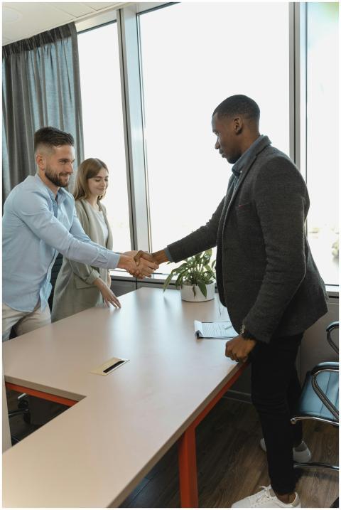 Professional handshake between colleagues in a mod