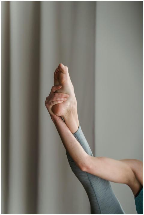 Crop unrecognizable barefoot female practicing str