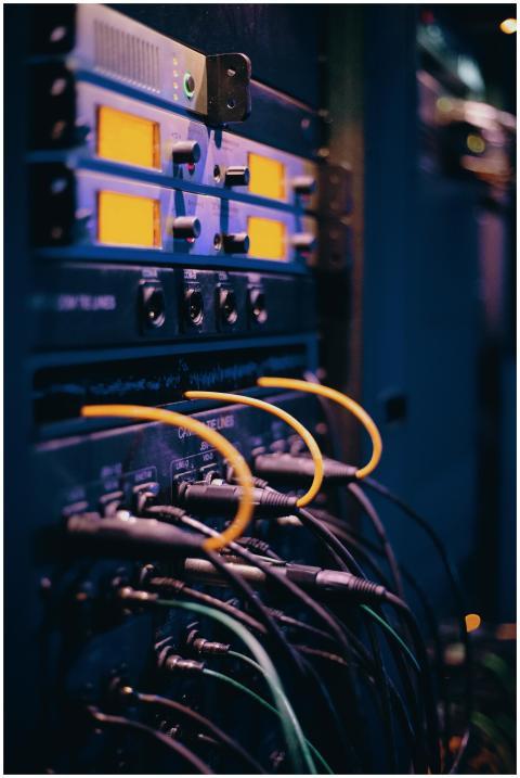 Close-up of network cables and ports in a server r