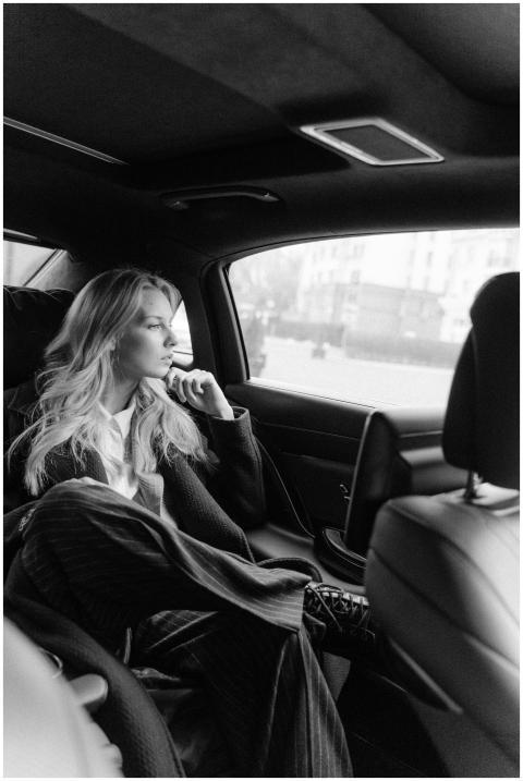 Black and white image of a thoughtful businesswoma