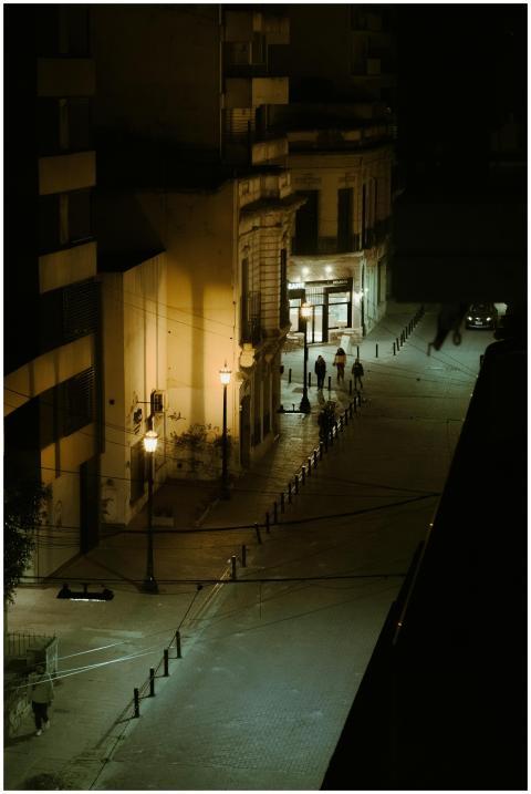 A moody, quiet night street scene captured in Rosa