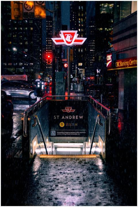 Stylish nighttime view of St. Andrew subway entran