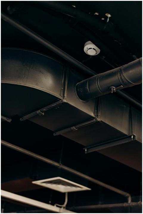Detailed view of industrial air ducts on a ceiling
