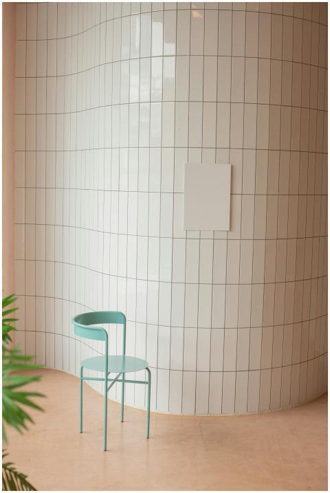 Interior of contemporary hall with green potted pl