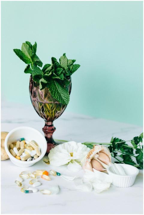 Stylish setup of herbal vitamins with fresh mint a