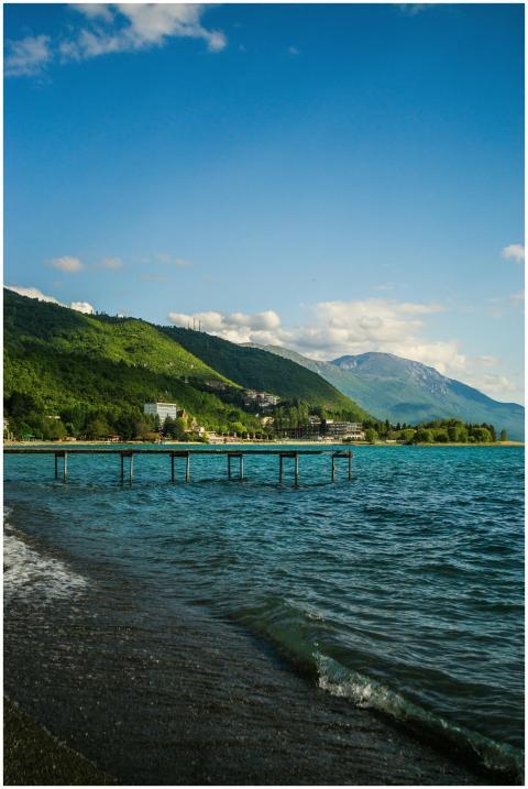 Tranquil scene of Ohrid Lake with green mountains