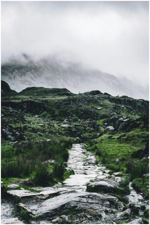 A scenic misty mountain pathway in Wales, perfect
