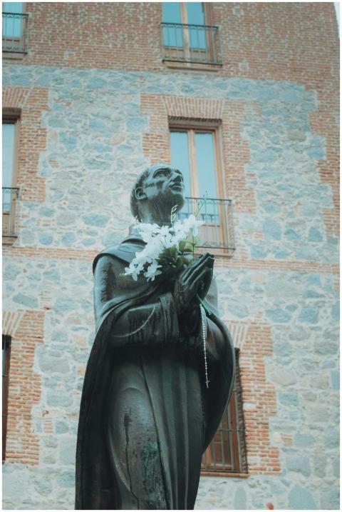 Close-up of a historic statue in Ávila, Spain, aga