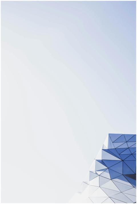 Abstract geometric architecture with clear sky and
