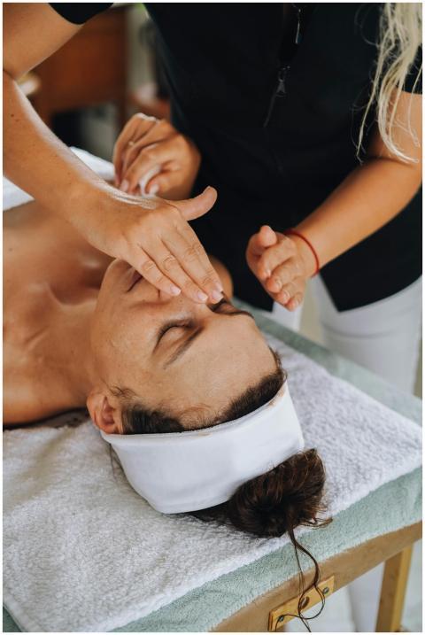 A relaxing facial massage session featuring a woma