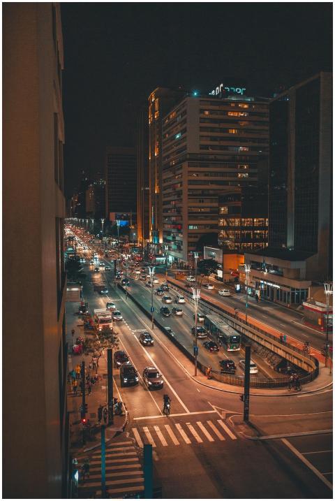 A vibrant night scene capturing the bustling traff