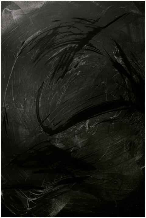 Intriguing black chalkboard with expressive chalk