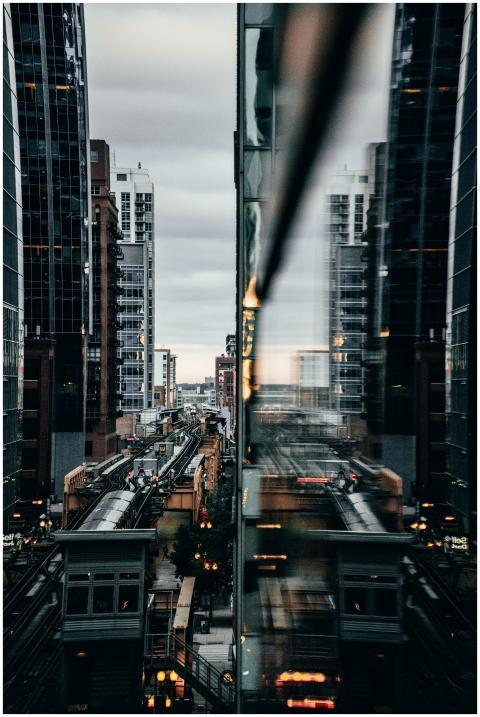 View of Chicago's elevated train with city reflect