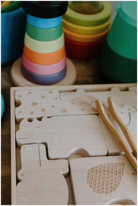 Close-up of vibrant wooden toys and puzzle pieces