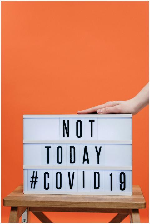 Lightbox with motivational message against COVID-1