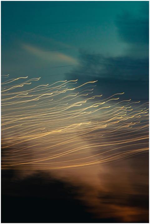 Mesmerizing abstract light streaks captured agains