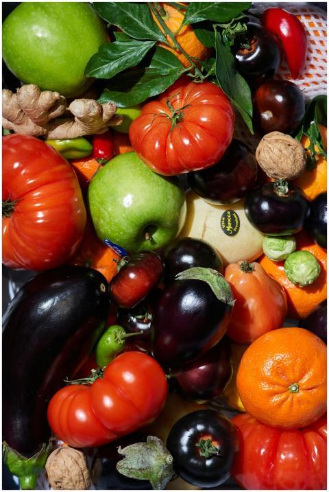 A colorful mix of fresh fruits and vegetables, inc