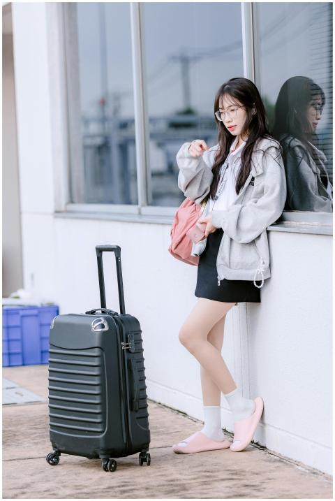 Young Woman Travelling Suitcase