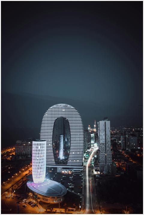 From above picturesque cityscape of illuminated sk