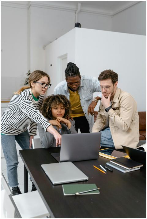 Diverse group of coworkers collaborating on a proj